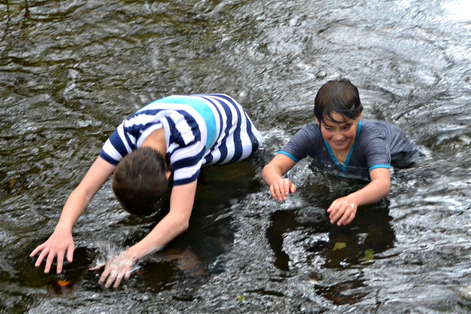 playing in river